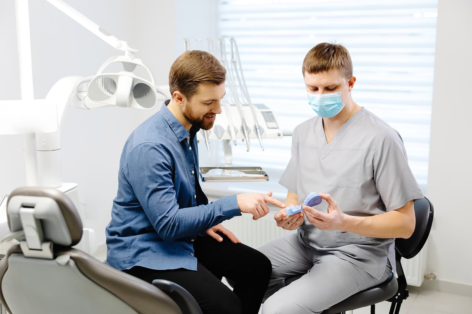 Patient Consulting with a Cosmetic Dentist in Farmington Hills